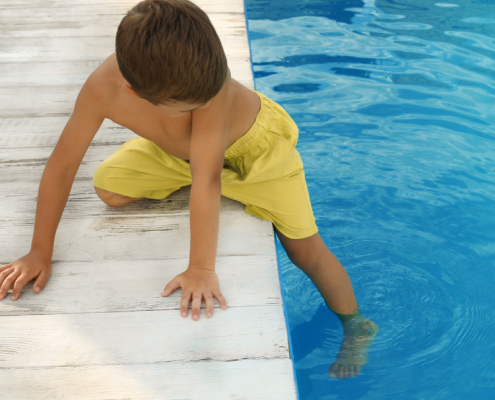 kid playing next to the pool with no fence brisbane